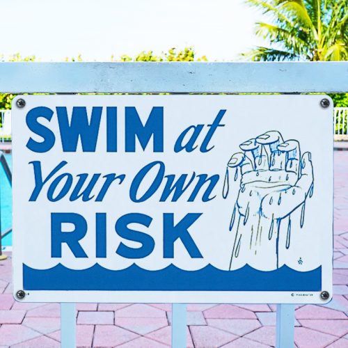 40318 | 12'' x 18'' Swim at Your Own Risk Sign - Lifestyle